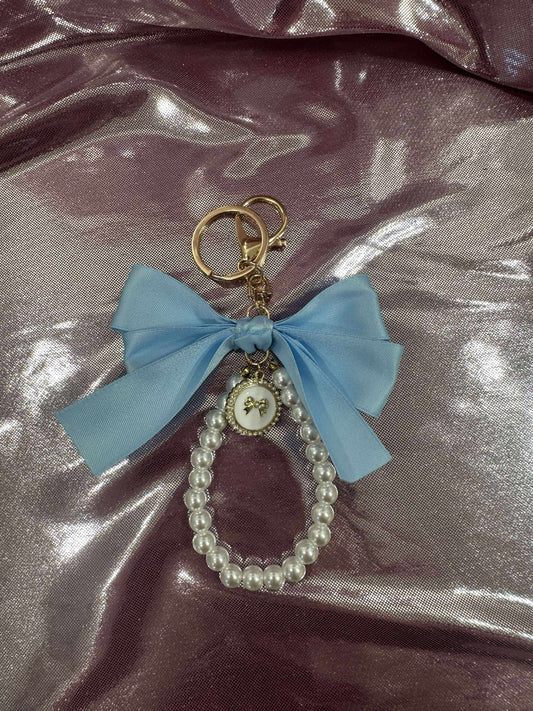 Light Blue Large Bow Pearl Finger Phone Strap