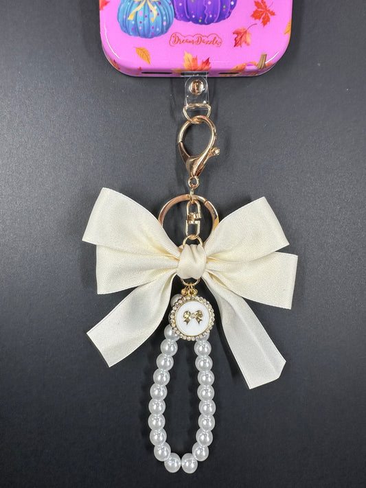 Cream Large Bow Pearl Finger Phone Strap
