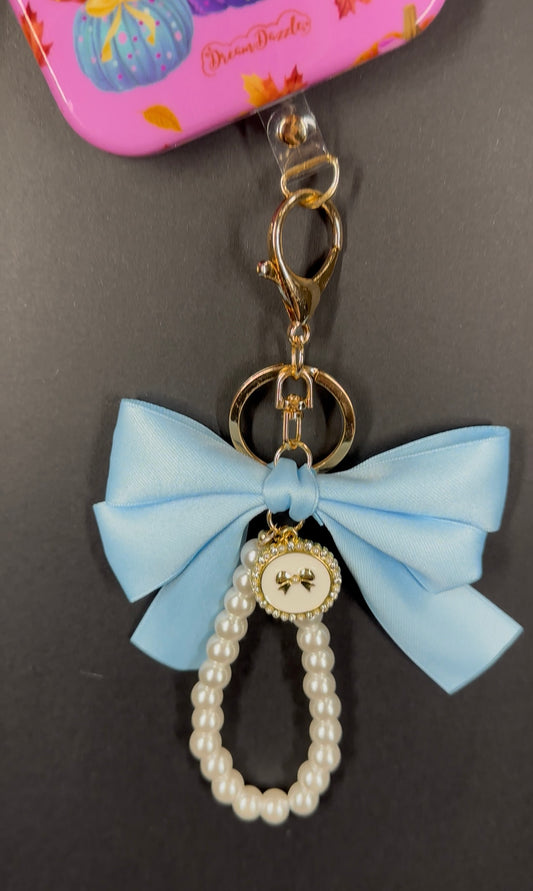 Light Blue Large Bow Pearl Finger Phone Strap