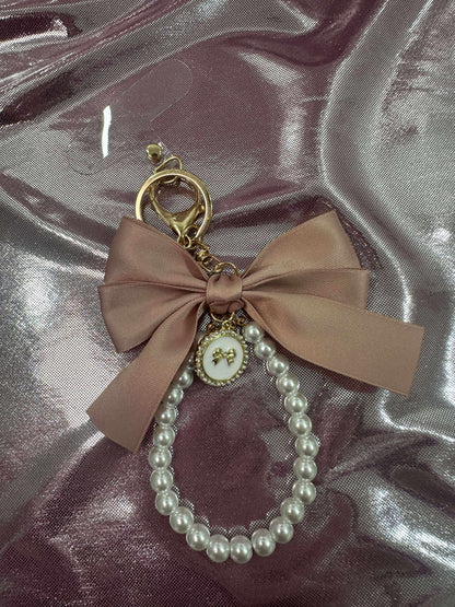 Vintage Pink Large Bow Pearl Finger Phone Strap